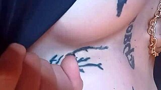 Goth woman with huge pussy lips shows off and masturbates her big pussy.