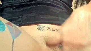 Goth woman with huge pussy lips shows off and masturbates her big pussy.