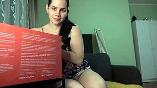 Anna carefully unpacks the scarlet sex doll from the tantaly store and sets it up