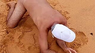 Hot gay Latino guy showing off his ass on the beach in solo scene