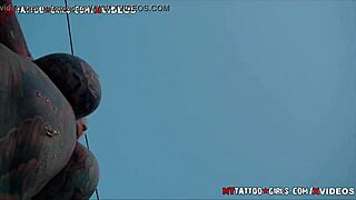 Blackwidow xxx lounges by pool, big tits on display.