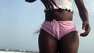Crazy bitch twerking hard in sexy clothes on the beach outdoors!