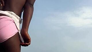 Crazy bitch twerking hard in sexy clothes on the beach outdoors!