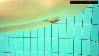 Hot hair redhead from Poland swims naked in the pool