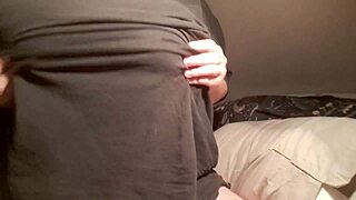 A young and innocent girl showing off her big natural boobs