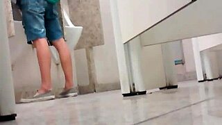 Amateur gay's bathroom action in a mall