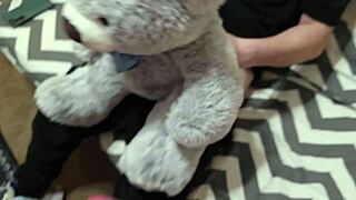 Fucking a teddy bear with bold intensity and raw action