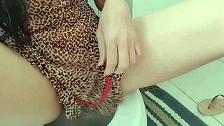 naughty latina girl sits to pee without panties showing her big shaved pussy in transparent nightgown