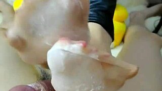 Footjob and cock covered with smelly stockings, cum inside and on top