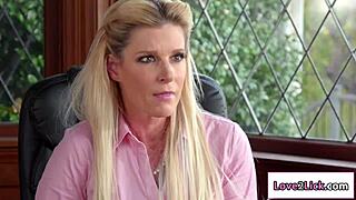 A young blonde lesbian licks her principal's hairy pussy while fingering herself.