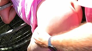 housewife's outdoor adventure with friend over gate