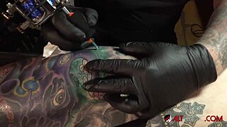 Marie Bossette Endures Brutal Leg Tattoo With Her Big Tits on Display