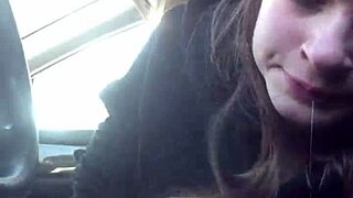Beautiful brunette gives best friend a sloppy blowjob in a car