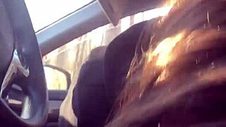 Beautiful brunette gives best friend a sloppy blowjob in a car