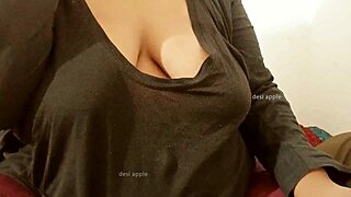 asian aunty displays her big tits