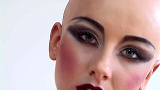 Bald head Luca Bella rocks a hot latex corset for kinky vibes!