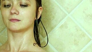 A beautiful brunette model washes up in the shower