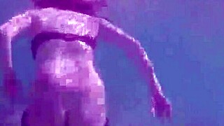 Public exhibitionist German teen VeronikaVonk flashes big boobs by the sea