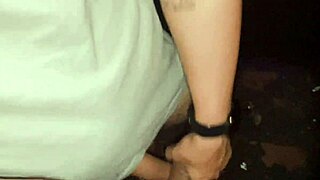 In a dark room, three horny guys engage in hot sex, covered in cum.