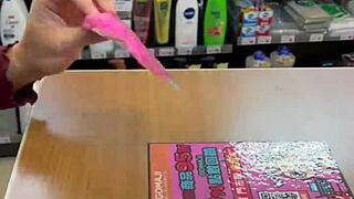 Beautiful Asian Ladyboy Seductively Shows Off Her New Stockings and Thong in the Bustling Convenience Store