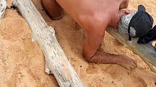 Young gay prostitute shows his ass on the beach in panties