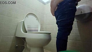 Amateur footage of a fat ass in the bathroom of a public mall in Madrid