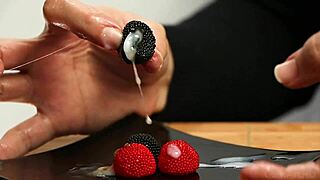 Intriguing CFNM Handjob Spills Cum on Candy Berries for a Wild Lunch