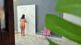 spying on busty african neighbor showering naked in backyard