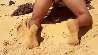 Hot shemale Ladysilva goes wild on the beach