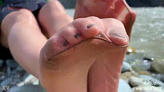 Goddess in tan nylons teases with her cute soles