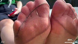 Goddess in tan nylons teases with her cute soles