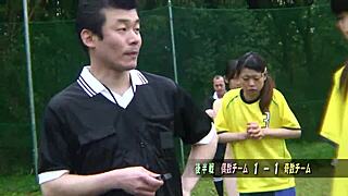 Young Asian girls playing football in the nude outdoors