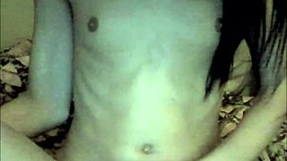 A young transsexual masturbates and cums on her stomach