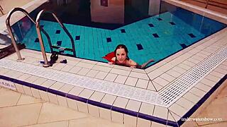 The sexy Avenna goes for a naked swim in the pool