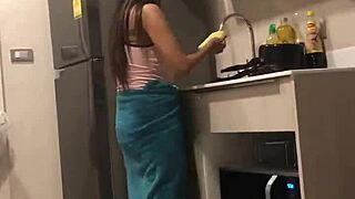 Beautiful Thai woman with large breasts in a sexy video