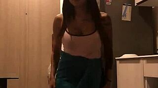 Beautiful Thai woman with large breasts in a sexy video