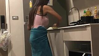 Beautiful Thai woman with large breasts in a sexy video