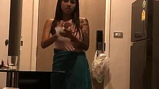 Beautiful Thai woman with large breasts in a sexy video