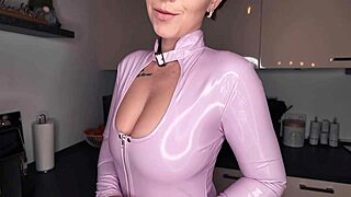 Only women will appreciate this hot latex outfit and nipple piercing