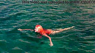 Naked Girl In Blue Water Exhibition