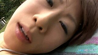 japanese milf sucks cock and fucks pussy outdoors