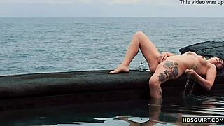 this free spirit girl, cat asstrophe, squirts wild by the shore outdoors.