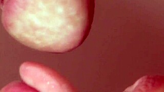 Intriguing close-up of pretty Japanese amateur giving intense blowjob and face fucking