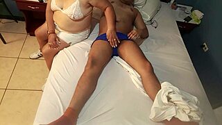 Amateur MILF masturbates and gives oral sex to a mature man