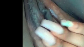 She feels so horny rubbing her pussy with passion.