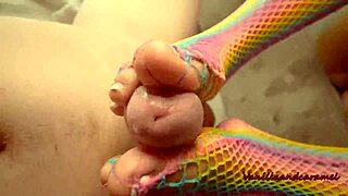sexy babe gives footjob while playing with her wet pussy