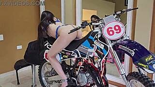Beautiful brown-eyed couple enjoys dirty talk and deep throat while on a motocross bike