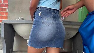 Latina in a skirt, washing, eager for intense action