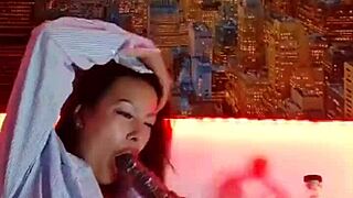 A hot girl named xxx masturbates in front of a bluee camera