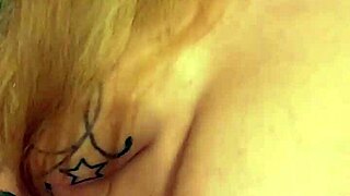 erica is naked and rubbing her big tits and perfect pussy.